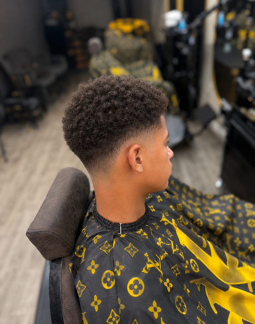 Krullen top fade